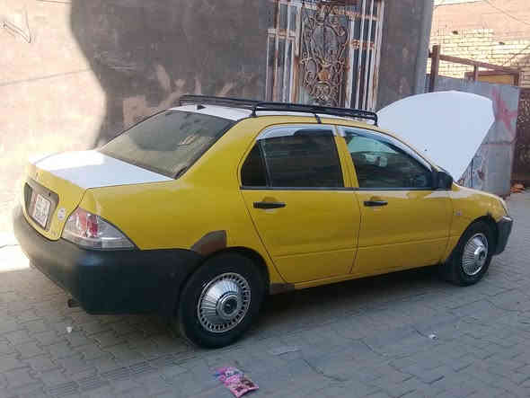 لانسر مشبوشي موديل 10 محرك 1600.... رقم بغداد نكليزي بسمي..... 
.. سياره خير من الله 
تبريد ثلج 
تخم تاير جديد  
دوشمه 
كير صدر مكفولات 
بس تلاحيض واضحه بصوره معمرات 
.......... 👍🏻ولمكينه تشتغل تك يعني واكفه خانه بيه.👍🏻..... 
وله هيه شاهد الله سياره كرفته تخبل وخير من الله 
سعر 69ورقه..  بيه مجال بسيط لطيبين رجائن لمو شراي لا يتصل عنوان... بغداد قرب سيطره.. شعب لقديمه... 
رقم *********** رقمي ثاني....
.***********......... ما متواجد على لفيس بوك تحياتي
