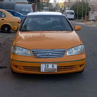 نيسان سني 2002 خصوصي رقم انكليزي مكينه كير حداديه مكفولات السعر 57وبيه...