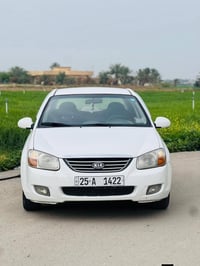 كيا سيراتو 2009 خليجي لون ابيض ثلجي رقم كركوك دولي سنوية لغاية 2029 شر...