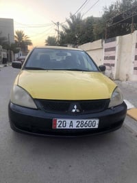 لانسر ٢٠١٠ • رقم ديالى • بدون نقص