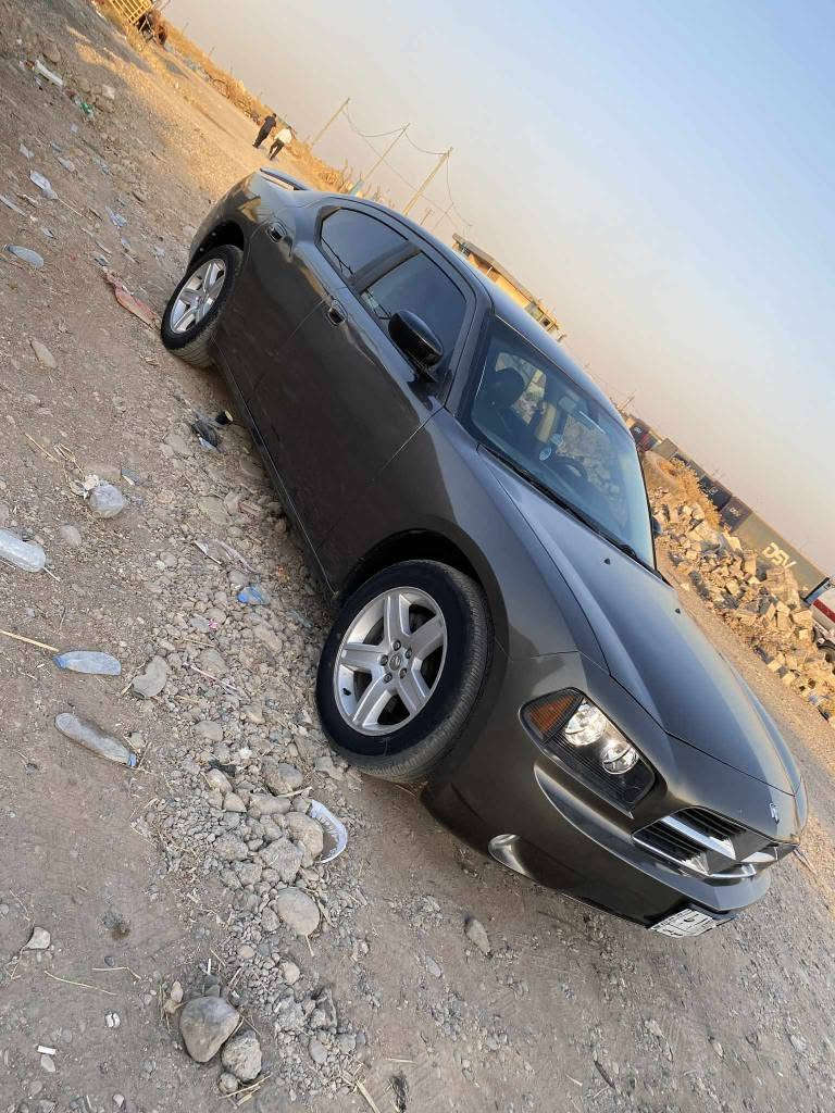 دوج موديل 2011 ليزه ري دوبه ي پيشو پاش كه پس بي ليدانه سه ياره كه تابلي جوانو خاوينه بي مه سروفه  تاخم پيشو پاش نويه جركه و سه د دولار بشكينه يك دينار مه سروفي تيا نيه لايت زينون ته بريد كوشن جلد كاره باي جوار تايه و ويلي نوي له ژيره مه كينه 3/5 مه رغوب گيرو مه كينه و دارو به ردي به شه رته كاره باي هه موشته ك به شه رته سه ياره كه تابلي جوانو خاوينه شوين هه ولير خه بات سعر 47 مه جاليكي كه م ژم *********** أربيل, العراق
