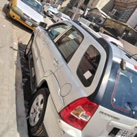 سيارة سبورتج رقم بغداد دولي السيارة بأسمي شرط التحويل موديل 2010 اللون...