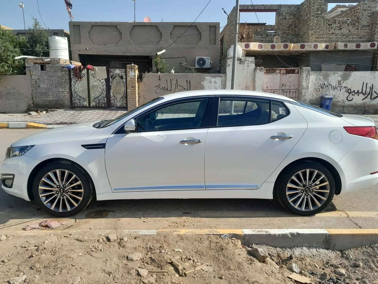 كيا اوبتيما خليجي 2013رقم نجف  مكفول من ضربه والصبغ وتبديل للبيع أو مرواس مكينة 2000 تخم تاير تبريد حداديه للإستفسار *********** مكان واسط قضاء الحي
