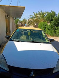 لانسر للبيع اوتوماتيك السنويه بأسمي ثاني يوم تحويل الكير والمحرك كفاله...