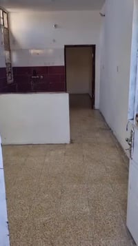 مشتمل طابق ثاني اللايجار في الشرطه الخامسه 07764053006