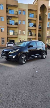 كيا سبورتاج خليجي  موديل 2012 ..  دفع رباعي  كاميرا خلفية  سقف بانورام...