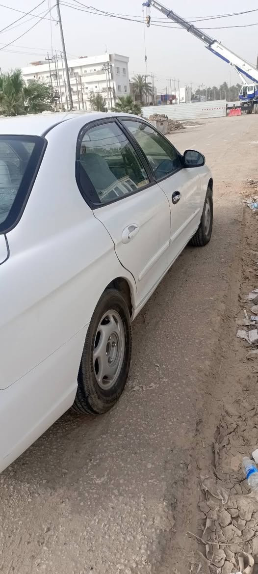 سوناتا موديل 2000بسمي مابيه اي نقص تبريد حداديه دواخل كير عادي  للتكلي شبيه تجي وتكلب واني خادم السياره نوزل وليس كابريتر مكاني ديوانيه***********
