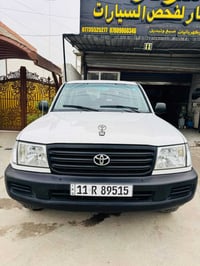 لاند كروزر  2003. رقم بغداد ب اسمي سياره كفاله كير محرك تبريد صدر اكسل...