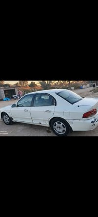 اوبتيما • ٢٠٠٤ • رقم نجف