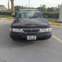 نيسان سني ٩٨ ياباني  محرك ٢٠٠٠  كير عادي  تبريد ثلج  تدفئه تشتغل  شاشه...