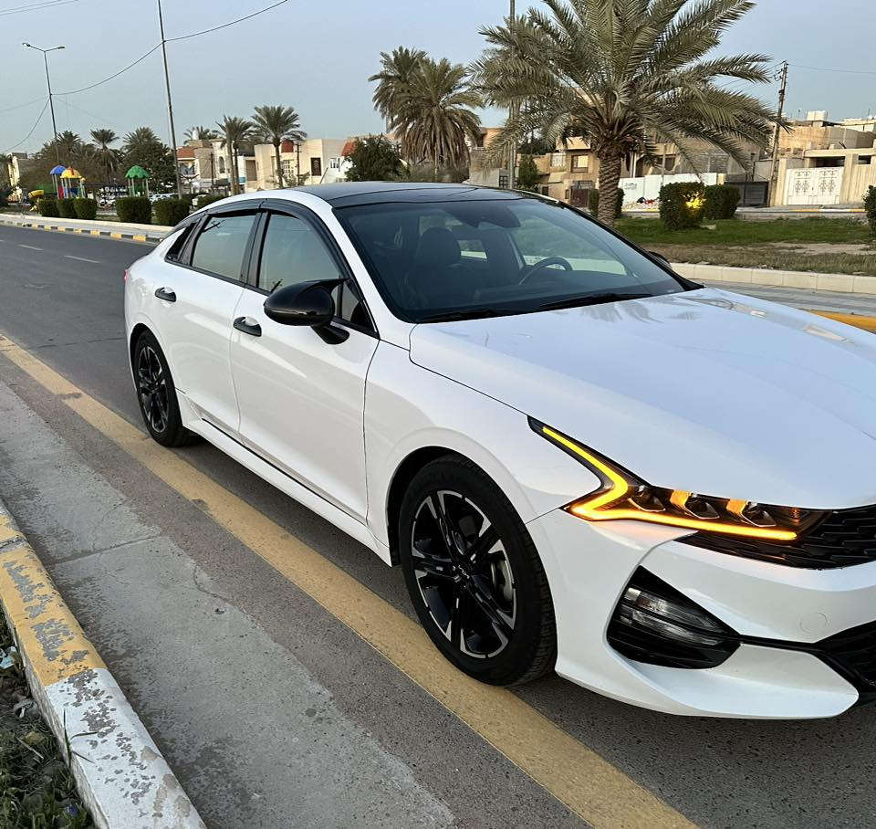 Kia K5 -Gt Line 2023 
وارد امريكي
فول موصفات
بنوراما
تشغيل عن بعد
محرك 1600تيربو
توقف ذاتي
رادارات امامي وخلفي وجانبي 
5 وضعيات قياده
دخول ذكي
مثبت سرعة 
شاشة كبيرة 
شحن لاسلكي 
هند بريك كهربائي 
بصمة
اشاير بلمري 
كامرة دواره 
اوتو هولد 
ترحيب بل اليدات
كشنات كهرباء وتدفئه
ماشيه 26 الف ميل
رقم اربيل باسمي

 حادثها فقط قطعه واحده باب الصدر مبدل بدون ايرباك 

مكاني بغداد الهاتف/*********** السعر 185وبيها مجال بسيط
