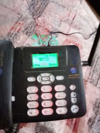 تلفون ارضي • هاتف سلكي