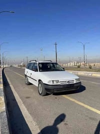 استرا 1992 رقم بغداد هزه جديده سياره باسمي تحويل مباشر محرك 18 كير اوت...