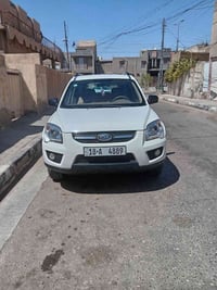 كيا سبورتج موديل 2009رقم بابل سيارة جديدة ونظيفة جدأ مكفولة سعر 130بيه...
