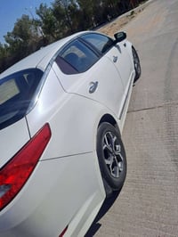 اوبتيما • ٢٠١٣ • ماشي ٣٠٠ ألف