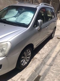 كيا كارينز 2012 خليجي لون سلفر فتحه+تحكم ستيرن سياره نظيفه السعر 125$ ...