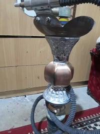 نركيلتين • خشب • كركوك