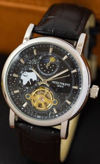 ساعة اوتوماتيك • تكويك