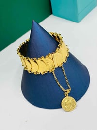 سوار ليرة • ذهب برازيلي • تكريت