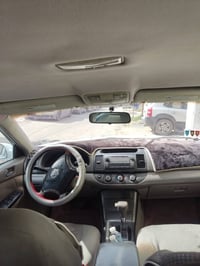 كامري ٢٠٠٦ امريكي بيه قطعتين صبغ المحرك بي تنقيص كير تدفئه تبريد كله ت...