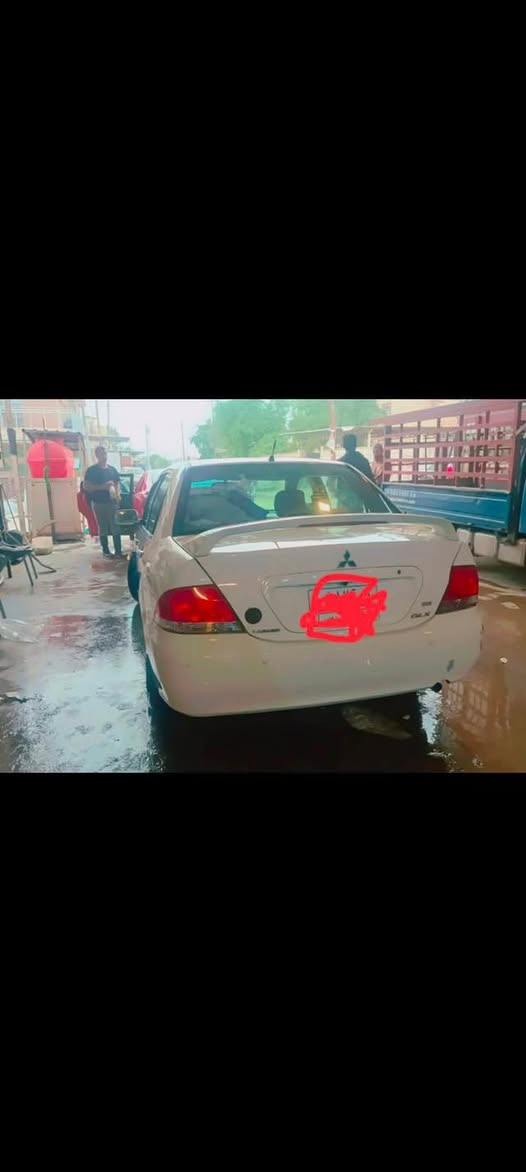 لانسر  موديل 2009 اللون ابيض كير اوتماتيك  مكفولةرقم مبايل ***********  من الضربة والصبغ سنوية  ٢٩ بأسمي رقم بغداد  الدواخل بيجي كهربائيات كلها شغالة :-
١. تخم تايرات
٢. باتري جديد 
٣. دوشمة جديدة 
٤. تحكم مري 
٥. تبريد  + تدفئة شغالة.
٦. شاشة مسجل 
٧. كاميرا+ حساسات 
٨. اسويچات عدد ٢ .
٩. سنتر لوك شغال  .
١٠. السيارة مواصفات سعودية
١١. مقبض الباب نيكل اصلي
