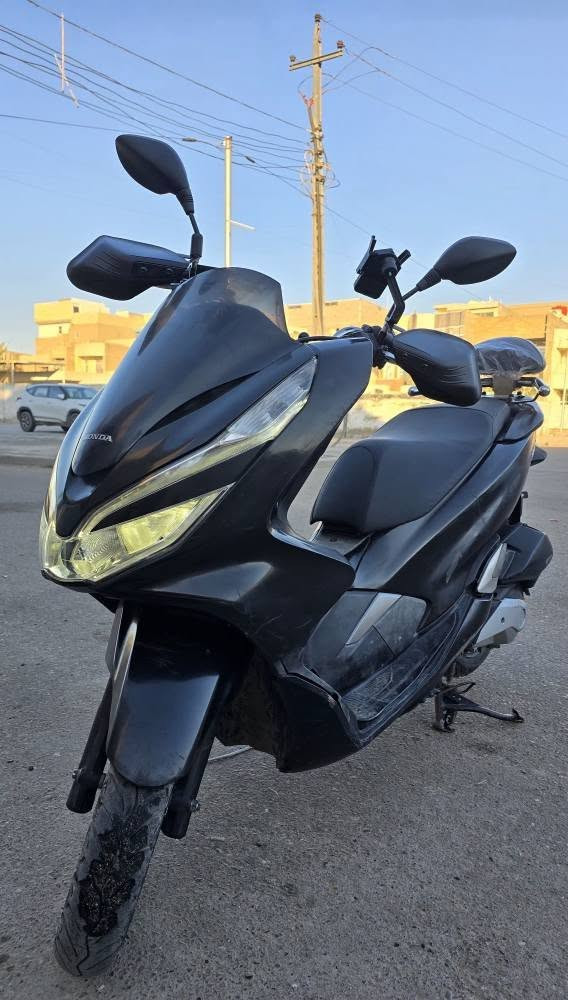 سلام عليكم
منشأ الدراجه  فيتنامي   2019
Pcx جيل الثالث 
مكينه. 150 cc
مكفوله مكينه كلجات 
نظافه ٩٠ بلميه  موضحه بلصور النظافه 
اي نقص مبيهه 
حساس ازدحام شغال A
ستاند جانبي كهربائي 
تايرات امامي خلفي جدد
مصدات هواء مري حامله موبايل كله جديد 
فلنجه امامي دسكات بنز خلفي  كله جديد 
 السعر ١٣  
الرقم *********** بغداد, العراق
