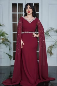 فساتين مناسبات • مقاس 46+ • ماروني سمائي