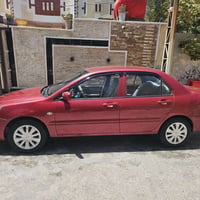 مسيبوشي لانسر 2011 رقم بغداد كير اوتماتيك نضيفه جدأ او 07716063798/078...