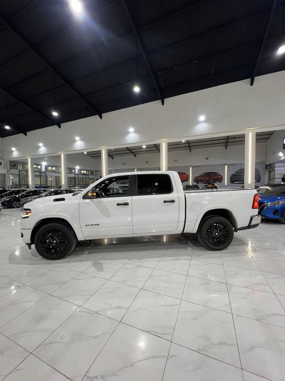 🔥 RAM 1500 موديل 2025 🔥
⚡ محرك 6 سلندر توين تيربو (Twin Turbo) – قوة وأداء عالي
🚙 دفع رباعي (4x4) جاهز لكل الطرق

✅ الحالة:
✔ بدون صبغ (وكالة)
✔ باب جبر + بودي قصير
✔ بك هورن (Bighorn) المرغوب

🌟 المواصفات:
✔ شاشة وسطية كبيرة حديثة
✔ كاميرا خلفية + حساسات
✔ تشغيل بصمة (Start/Stop)
✔ نظام دخول ذكي
✔ كير أوتوماتيك 8 سرعات
✔ مقاعد مريحة قماش / كهرباء
✔ تحكم ستيرن (ستيرن مالتي)
✔ مثبت سرعة
✔ نظام توفير الوقود (Eco Mode)
✔ نظام مانع الانزلاق والثبات
✔ رنقات ألمنيوم وكالة
✔ إنارة LED أمامي وخلفي

💥 المميزات:
✔ محرك اقتصادي مقارنة بالقوة
✔ مناسب للعمل والسفر
✔ سيارة نظيفة وجاهزة

💰 السعر: 243 ورقة وبيه مجال
📍 الموقع: أربيل
📞 للاستفسار: ***********
