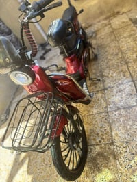 بسكل كهربائي • شحن بطارية • شاشة بصمة