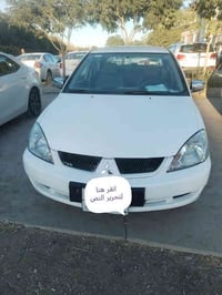 لانسر ٢٠٠٩ • جير توماتيك • ١٣٠٠ سي سي