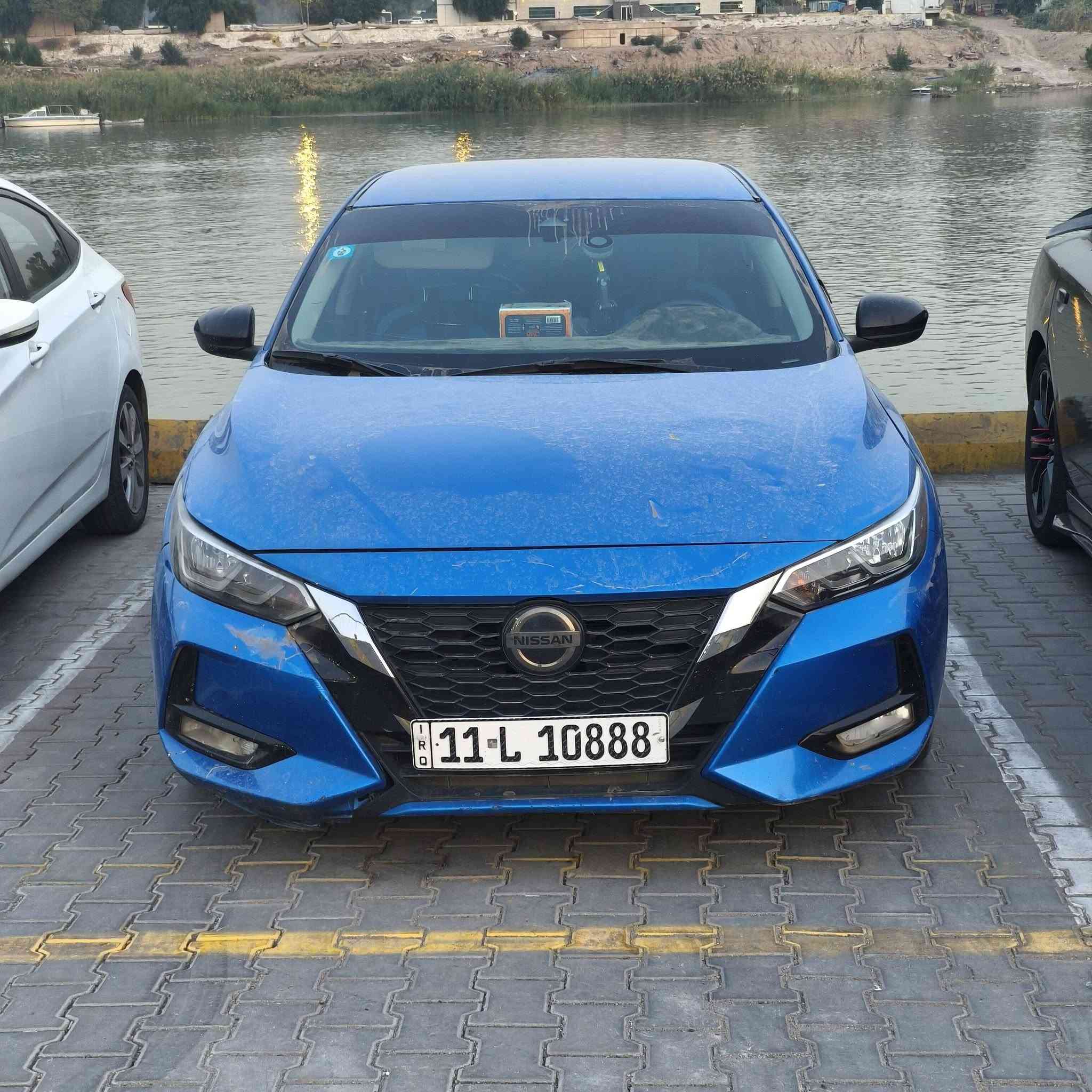 السيارة : نيسان سنترا  Sv مراوس مع كمارو
سنة الصنع : 2021
الفئة : Sv
اللون : ازرق بحري ❤️
المحرك : 2000 ✈️ تنفس طبيعي 
 #السعر  _ 130$ وبيه مجال بسيط  
حادثها فقط جاملغ ايمن وباب وموضح بالسونار
صور حادث داخل منشور  
المواصفات : 
-بصمة و بصمة ابواب
-تشغيل عن بعد
-هاندبريك بصمة 
-اوتو هولد 
-رادار امامي قيادة ذاتية تفاعلي مع شارع تحديد مسار
-رادار خلفي + رادار جانبي 
-لايت زينون بلادي + 
- حساسات خلفي اوتو ستوب 
-ستيرن تدفئه 
‏-شاشة كبيرة و (Apple car play +Usp+Aux)
-نظام GPS (بوصله)
-كامرة خلفية
‏- ‎ويل كب
-تبريد ثلاجة كله جديد راديتر بخاخ كمبريسر كله جديد وغاز اصلي
-بلكات جدد اصليات وكالة 
-  تايرات جديد السيارة هزة جديدة رقم انكليزي جديد ومميز السنوية جديد وباسمي  
العنوان (((( بغداد منطقة علي الصالح))))
الرقم : *********** 
 للاستفسار {{ [hidden information]}}
