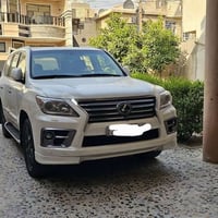 لكزز موديل 2012 صبغ بنيد والجاملغ الايسر  الباقي مكفول سيارة نضيف  سنو...