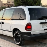 دوج كرفان موديل 2000  كير اوتو  كير ومكينه كامري   7 راكب  تخم تاير جد...