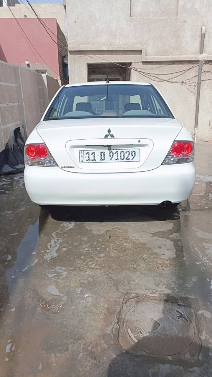 لانسر 2011 كير ومحرك مكفول ماشيه ١٣٩ السعر ٩٨ المكان  بغداد الشعب ***********
