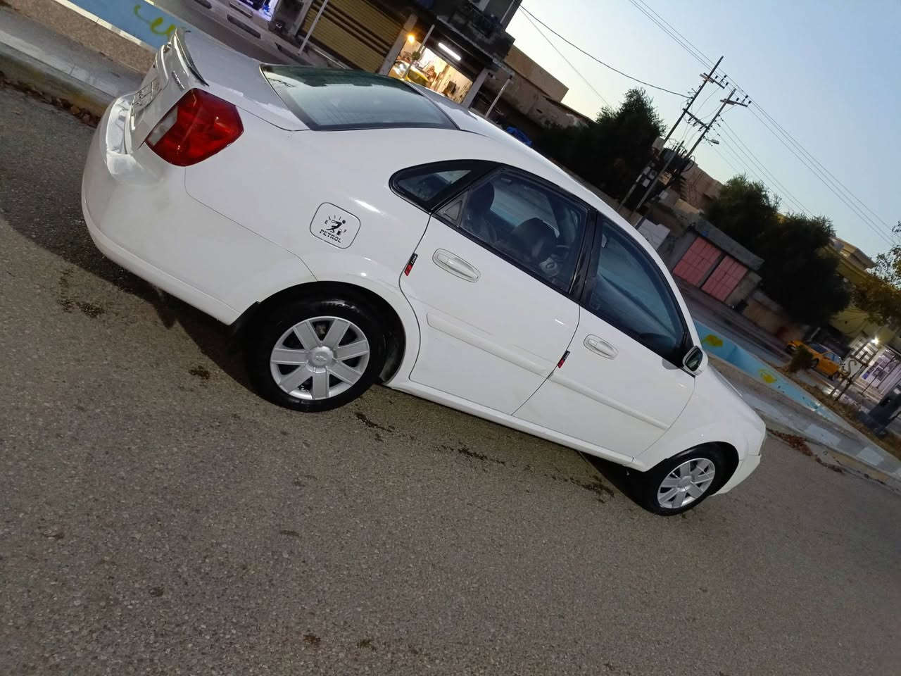 للبيع شوفرليت اوبترا صالون موديل 2013 رقم سليمانية شرط التحويل والغرامات كير اوتماتيك شرط كير ومحرك سنويه لل 2023 هزه وبراد جديد السياره بيها بس 3 قطع صبغ صدر جديد تايرات جديد باتري جديد كهربائيات شغاله شاشه عنوان السياره في كركوك السعر 69 ومجال قليل 
***********
***********
