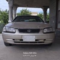 سياره كامري مديل 2000 لون اصفر ذهبي محرك و تبريد وكير مكفولات تخم تاير...