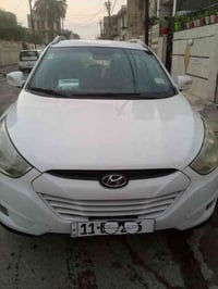 توكسان 2012 خليجي رقم بغداد الإنكليزي محرك 2000 كشنات جلد شاشة وكاميرة...