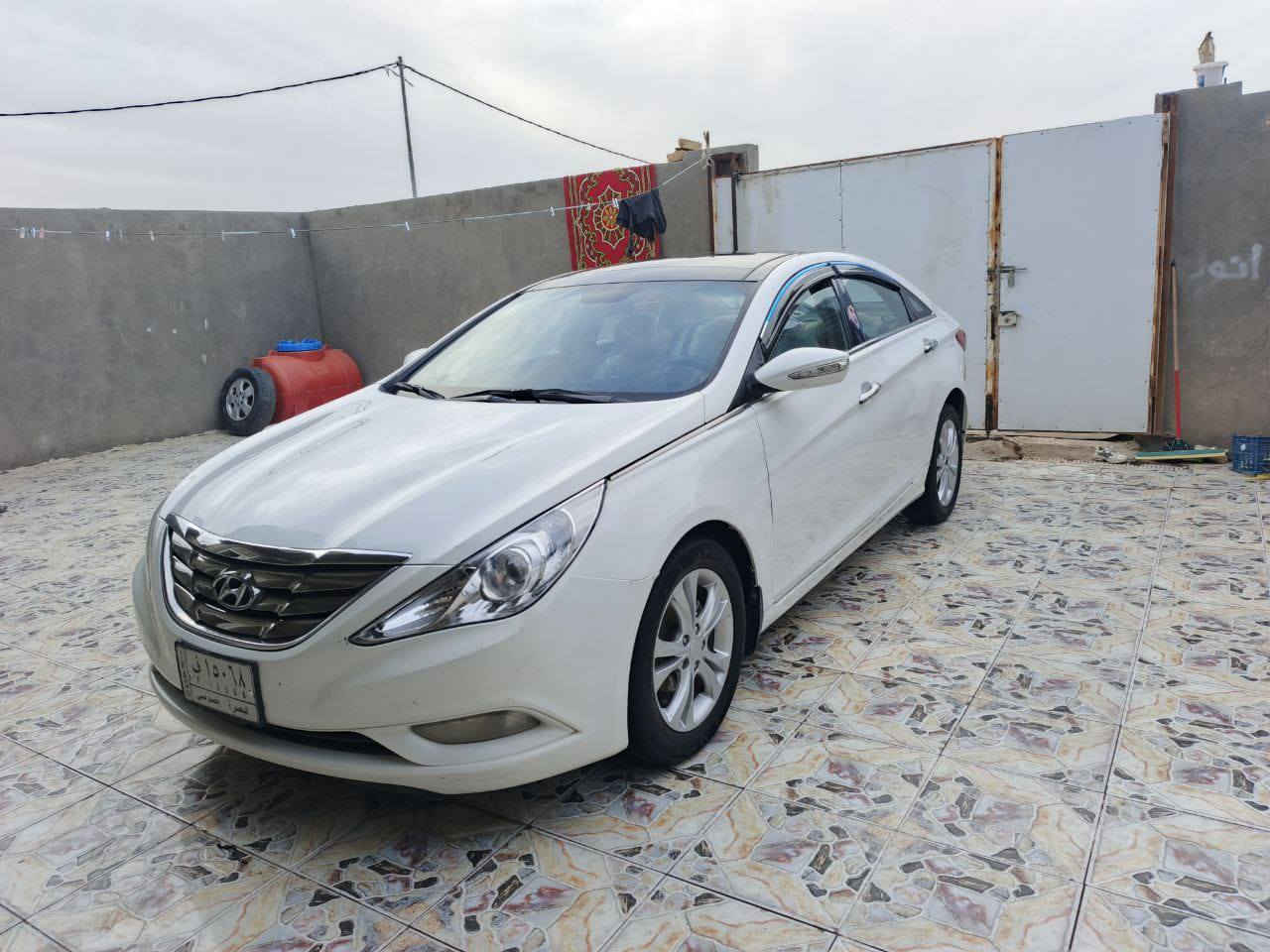 هونداي سوناتا موديل 2011 رقم بصره حره تحويل ثاني يوم سنويه مجدده 27 مشروع وطني وارد خليجي مكفوله من الضربه والتبديل بيه صبغ جاملغ الكدام وداير الجاملغ الخلفي  مكينه 2400 شرط ما مفتوحه مكينه وكير وحداديه وتبريد وتدفئه وتخم تايرات كله مكفول سياره جاهزه فول مواصفات واحد على واحد تحكم ستيرن شاره بل مرايه شاشه كبيره كامره دسك خلفي وأمامي ويل كب مري شفط كشنات كهربائيه بنراما فول واحد على واحد ماعده بصمه مكان سياره ناصريه سعر 109 بيه مجال قليل رقم الهاتف ‏‪***********‬‏ أنه مكلف بل نشر خابر راعيه بيك خير وتدلل
