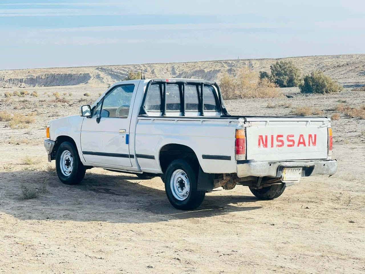 سلام عليكم للبيع نيسان 91 رقم مثنى مشروع وطني شرط تحويل سنويه 2027 كير محرك مكفولات جدد لشرط شاصي مكفول سياره حلوه نضيفه جاهزه مكفوله كفاله عامه من دعمه والكلبه لشرط ماعده رشه صبق حزام جماليه فقط لشرط سياره مالت جناي جاهزه من كلشي ترايك وين ماتريد  سعر 28وبيه مجال *********** مكان سماوه الخضر
