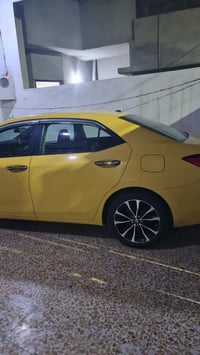 عندي كورلا للبيع موديل 19 XLE  فول 1/1 رقم بغداد بأسمي ضرر جاملغ وبنيد...