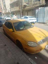 للبيع دايو لكنزه موديل 2001 سياره شغاله بيه نواقص بصيطه  مثل ما واضح ب...