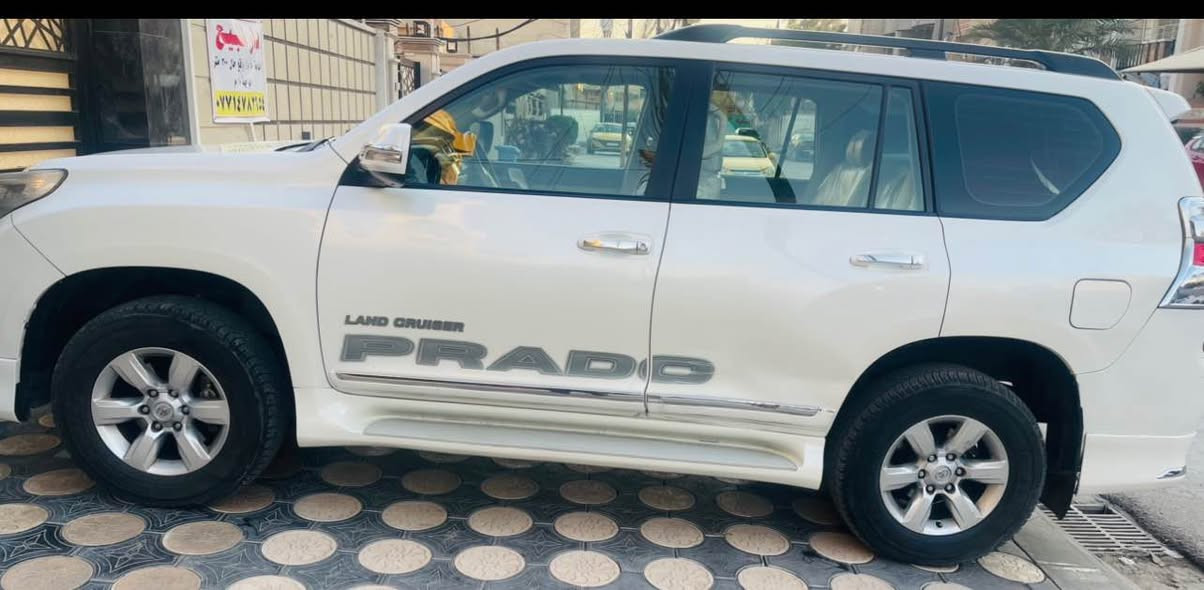 تويوتا برادو 2014 Txl  وكالة ساز
السيارة بيها بابين ابديل وجاملغ خلفي عكس البابين ماشية180
مواصفاتها : 
١-سلايت قماره
٢-مثبت سرعة
٣-حساس خلفي
٤-كاميره خلفي
٥- دبل تانكي  
٦- اشارات بالمرآة
- كشافات ضباب
٧-كراسي مخمل بيجي 
٨-شاحن واير ليس
٩-شاشه اصلية 
١١-حساس تاير   
١٤-مانع انزلاق
١٥-اربع جام اوتو
١٧-زراك لايت 
١٨-هوك خلفي 
١٩-ارضيات (كاعيات) اصليه 
٢٠-بصمات اثنين 
٢١-تكم ارضيه ليزري 
٢٢-تحكمات فول ستيرن 
٢٣-طفايه اصلية
٢٤-نظام زحف 
٢٥-ترحيب
٢٦-مري جانبي كهربائي (شفط)***
٢٧-تشغيل عن بعد *
٢٨-عدة طوارئ
 ٣٠- داخل بيجي
٣١-شاشة ملاحة باللمس
- كاميرا خلفية 
- بلوتوث
- مشغل CD
- منفذ AUX & USB
٣٢-محرك 4.0 لتر 6 سلندر 
اضائه داخليه
الاستفسار اكثر الاتصال***********بغدادحي القاهرة سعرمناسب اتصل وتدلل بغداد, العراق
