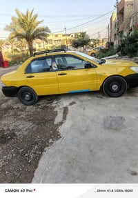 لانسر موديل ٢٠٠٩ مريكي ضربته بل صندوك سياره جديده تخم تاير جديد صدر جد...