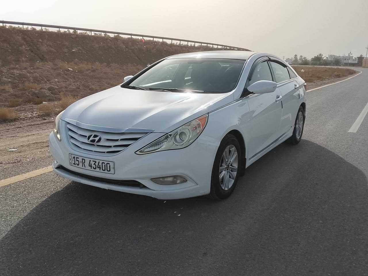 سلام عليكم من رخصت الادمن للبيع سوناتا مضلع موديل 2012 وارد امريكي حادثه بلداير مال  جاملغ الخلفي بدون دواخل وبيه اربع قطع صبغ كله ليبل واحد كير ومحرك وصدر خير من الله محرك 2400 جيدي اي رقم انبار انكليزي سعر 105 وبيه مجال مكان السياره فلوجه النساف غير متواجد ع الفيس ***********
