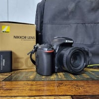 للبيع كامرة نيكون D750 فول فريم مع عدسة 50m 1.8G مع جنطة ظهر مقسمة و ش...