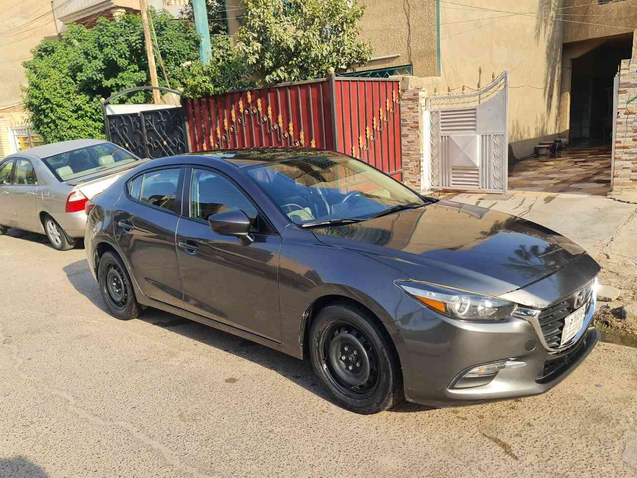 مازدا 3️⃣ موديل 2018 وارد أمريكي ماشيه اكثر من 70 الف ميل رقم بغداد وياها تخم ويل كب مع تايراتها مع كبات الاتصال على الرقم ***********
