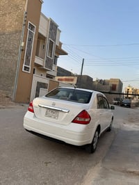 نيسان تيدا 2012  بيها صبغ اقل الاحزام بس نكول احزام  سياره مكفوله من ك...