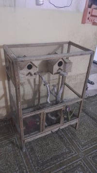 قفص طيور حب بي بيتين وشجره السعر 25 وبي مجال الرقم 07700847091 بي بس و...