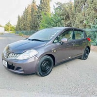 تيدا ٢٠٠٩ • قير اوتوماتيك • كاوتش جديد